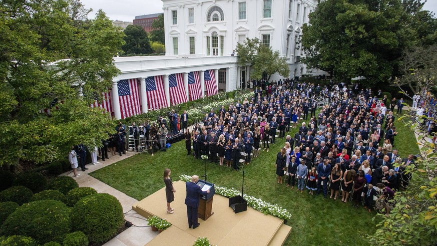 epa08700229 US President Donald J. Trump introduces Judge Amy Coney Barrett as his nominee to be an Associate Justice of the Supreme Court during a ceremony in the Rose Garden of the White House in Wa ...