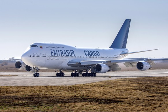 FILE - A Venezuelan Boeing 747, operated by Venezuelan state freight line Emtrasur, taxis on the runway after landing in Cordoba, Argentina, June 6, 2022. Argentine presidential spokesmen...
