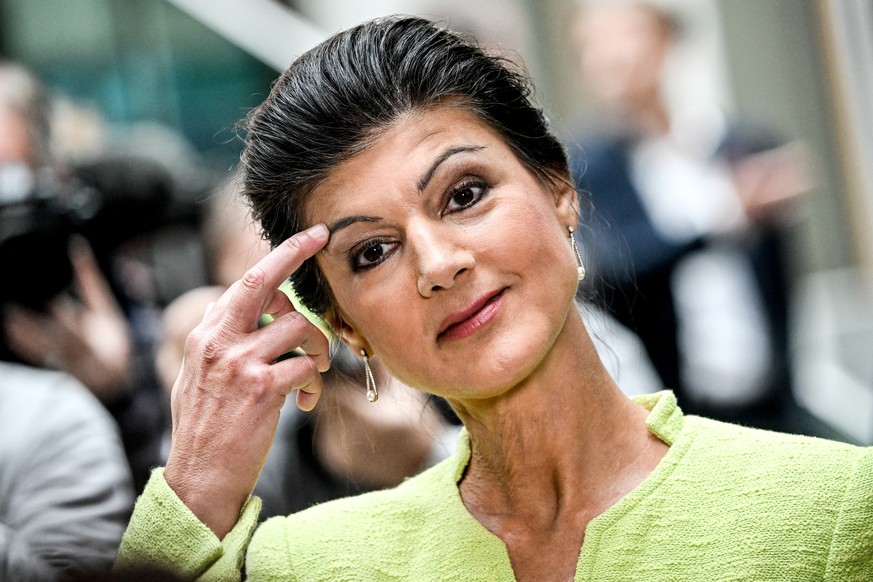 epa10934029 German left-wing politician Sahra Wagenknecht talks to the media after presenting plans for a new political project called &#039;Alliance Sahra Wagenknecht&#039; in Berlin, Germany, 23 Oct ...