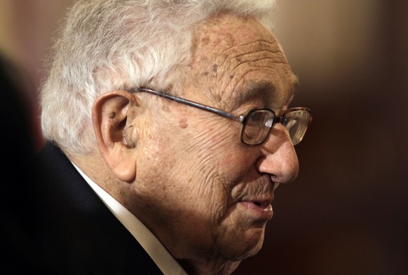 Former Secretary of State Henry Kissinger attends a luncheon for Japanese Prime Minister Shinzo Abe at the State Department in Washington, Tuesday, April 28, 2015.(AP Photo/Luis M. Alvarez)