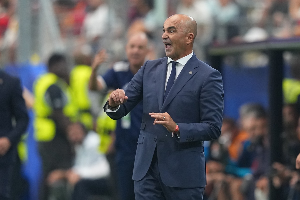 Portugal head coach Roberto Martinez reacts during the World Cup round of 16 soccer match between Portugal and Spain in Arlington, Texas, near Dallas, Monday, July 6, 2026. (AP Photo/Julio Cortez)
Rob ...