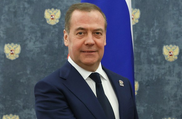 epa11926404 Deputy head of Russia&#039;s Security Council Dmitry Medvedev (L) greets member of the Politburo of the Central Committee of the Workers&#039; Party of Korea (WPK), Secretary of the WPK Ce ...