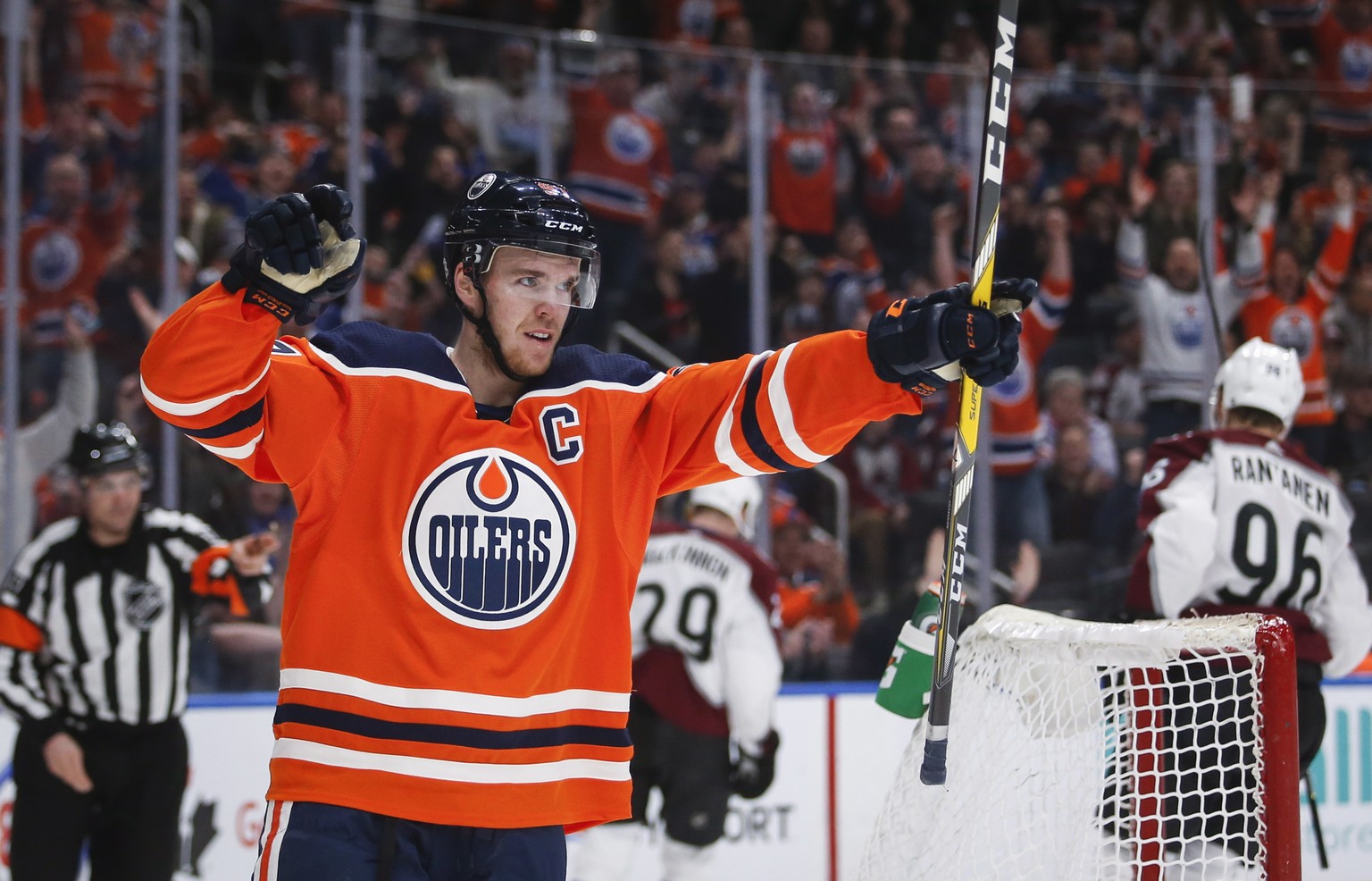 FILE - In this Feb. 22, 2018, file photo, Edmonton Oilers&#039; Connor McDavid celebrates scoring in overtime against the Colorado Avalanche during an NHL hockey game, in Edmonton, Alberta. Hockey fan ...