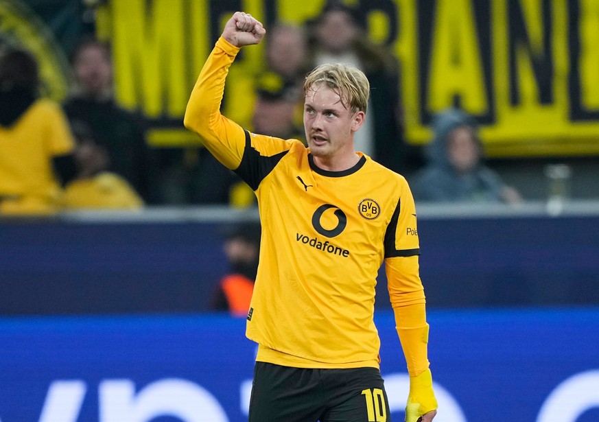 Dortmund's Julian Brandt celebrates after scoring his side's fourth goal during the Champions League opening phase soccer match between Borussia Dortmund and Athletic Club Bilbao in Dortmund ...