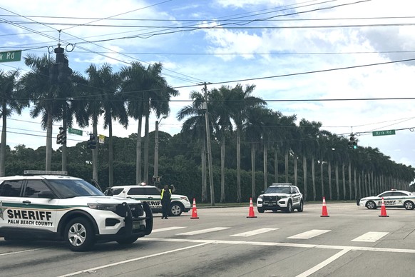 Sheriff vehicles are pictured near Trump International Golf Club, Sunday. Sept. 15, 2024, in West Palm Beach, Fla., after gunshots were reported in the vicinity of Republican presidential candidate fo ...