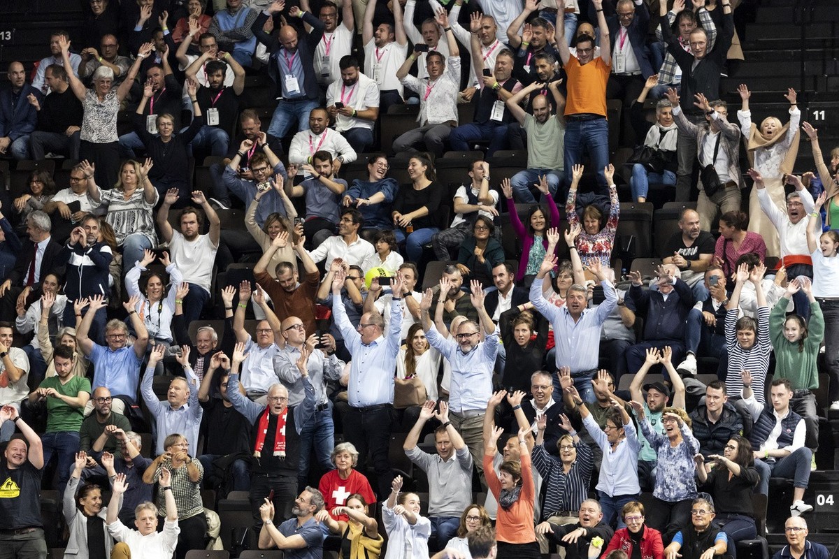 Spectators cheer during the round of eight match between Stan Wawrinka of Switzerland and Brandon Nakashima of the United States at the Swiss Indoors tennis tournament at the St. Jakobshalle in Basel, ...