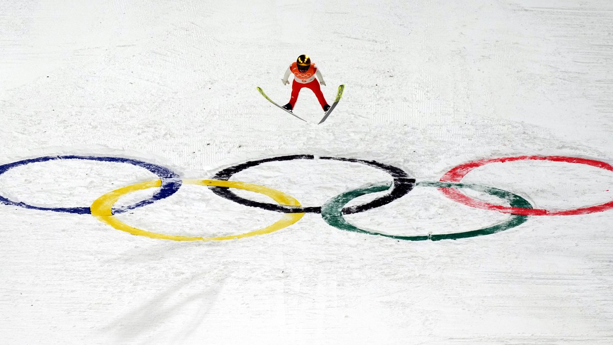 epa09755465 Simon Ammann of Switzerland during the Men's Team Ski Jumping Large Hill final at the Zhangjiakou National Ski Jumping Centre at the Beijing 2022 Olympic Games, Zhangjiakou, China, 14 ...