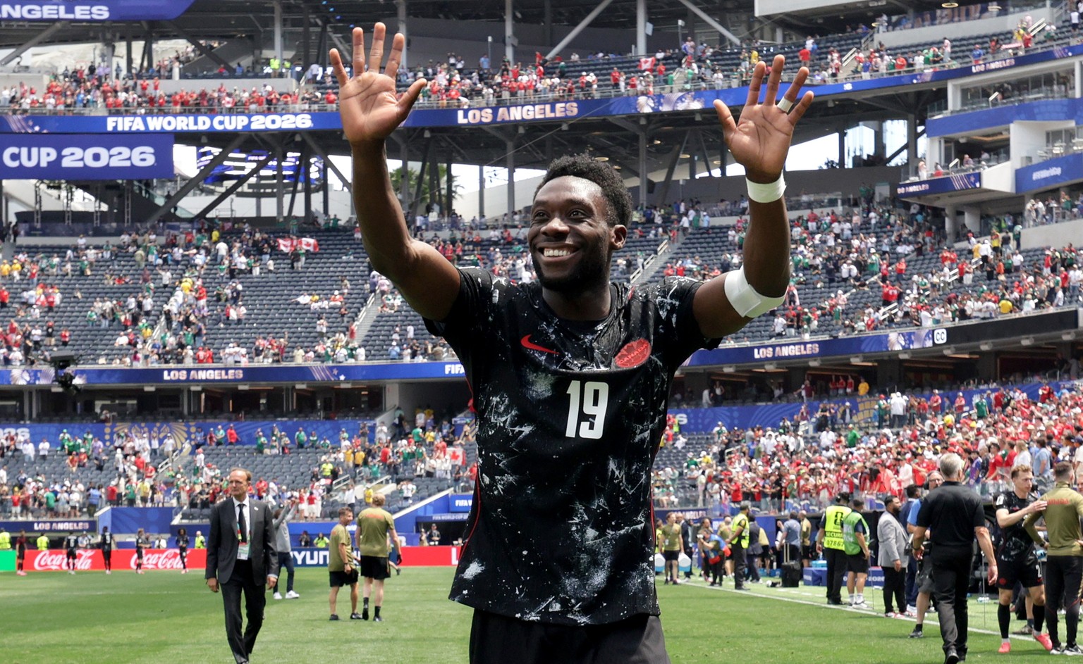 epa13071293 Alphonso Davies of Canada waves as he leaves the pitch after the FIFA World Cup 2026 Round of 32 match South Africa against Canada, in Los Angeles, USA, 28 June 2026. Canada won 1-0. EPA/C ...
