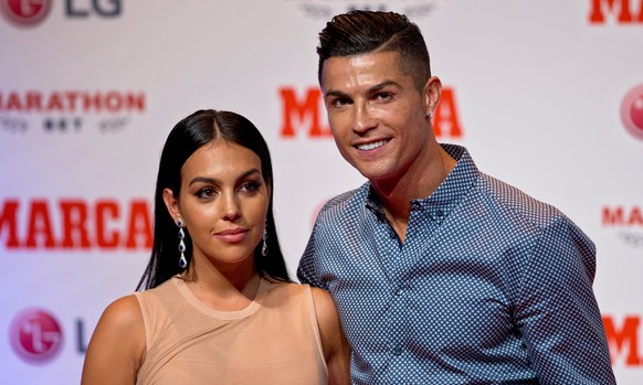 FILE - Juventus soccer player Cristiano Ronaldo poses with his partner, model Georgina Rodriguez in Madrid, July 29, 2019. (AP Photo/Paul White, File)
Ronaldo Engagement Soccer
