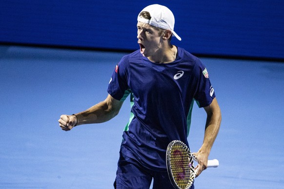 epa07951365 Alex De Minaur of Australia reacts during the semifinal match against Reilly Opelka of the United States at the Swiss Indoors tennis tournament at the St. Jakobshalle in Basel, Switzerland ...