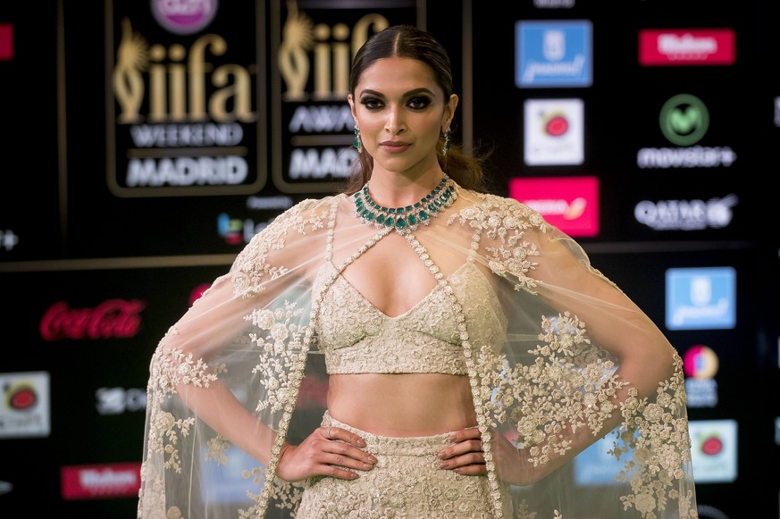 Bollywood actress Deepika Padukone poses for photographers at the International Indian Film Academy (IIFA) Rocks Green Carpet for the 17th Edition of IIFA Weekend &amp; Awards in Madrid, Spain, Saturd ...