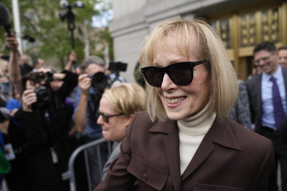 E. Jean Carroll walks out of Manhattan federal court, Tuesday, May 9, 2023, in New York. A jury has found Donald Trump liable for sexually abusing the advice columnist in 1996, awarding her $5 million ...