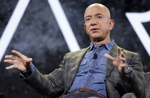 FILE - Then Amazon CEO Jeff Bezos speaks at the the Amazon re:MARS convention on June 6, 2019, in Las Vegas. Federal regulators are ordering Amazon founder Jeff Bezos and CEO Andy Jassy to testify in  ...