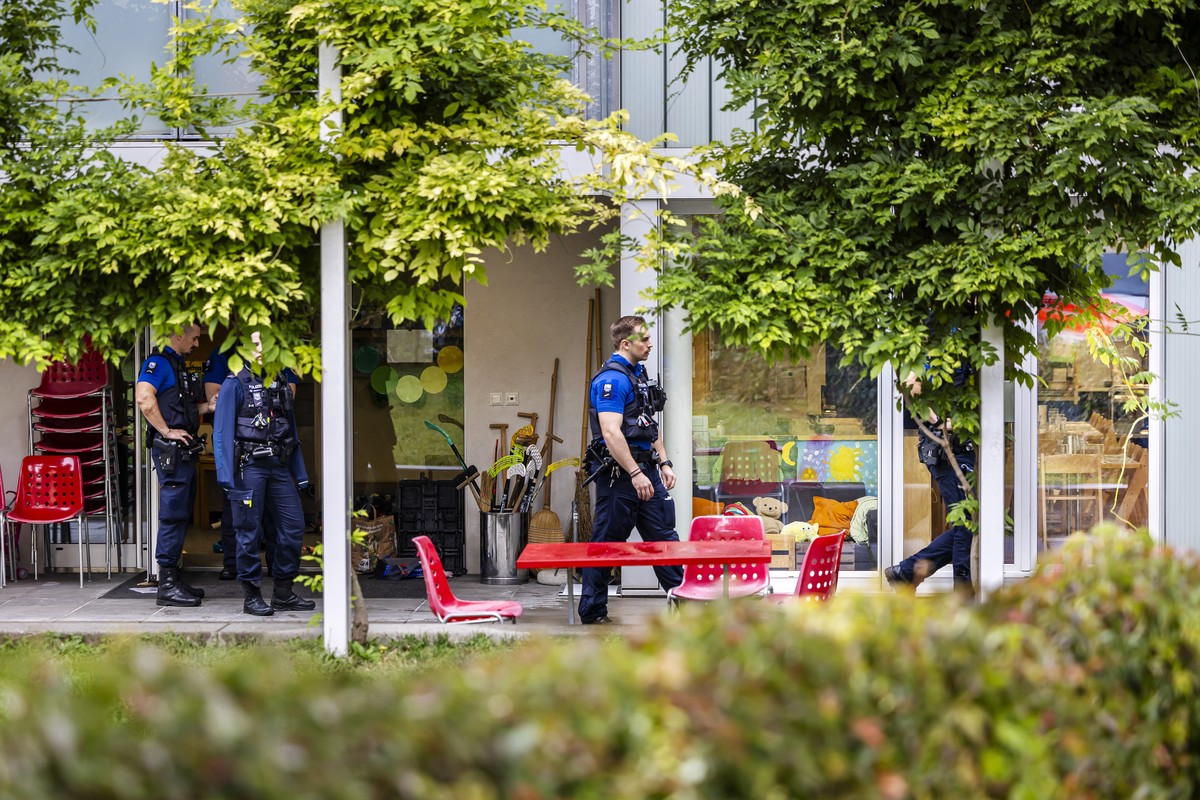 Police officers during an operation outside an after-school care facility in Zurich Oerlikon, Switzerland, on Tuesday, October 1, 2024. A 23-year-old man attacked a group of after-school children with ...