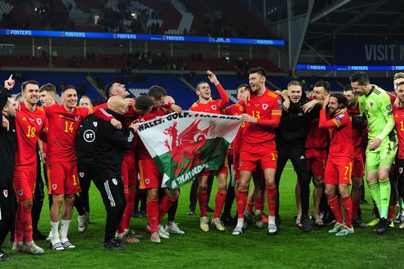 CARDIFF, WALES - NOVEMBER 19: Wales celebrate at full time during the UEFA Euro 2020 Group E Qualifier match between Wales and Hungary at the Cardiff City Stadium on November 19, 2019 in Cardiff, Wale ...