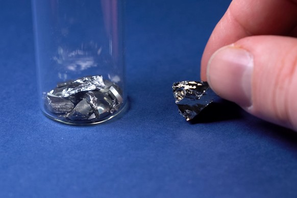 Pieces of germanium metal. Rare earth metal xkwx element, chemistry, closeup, education, ge, germanium, granulate, metal, natural, object, periodic, sample, school, science, semiconductive, semiconduc ...