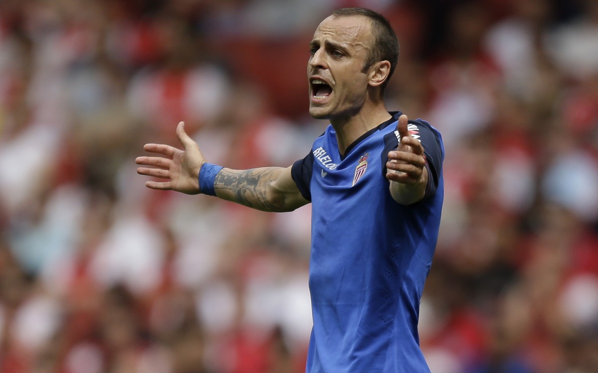 AS Monaco's Dimitar Berbatov shouts and gestures in frustration after a teammate failed to pass to him during the Emirates Cup soccer match between AS Monaco and Valencia at Arsenal's Emirat ...