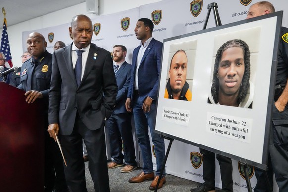 Houston Police Chief Troy Finner, left, and Mayor Sylvester Turner announce an arrest in connection with the fatal shooting of Kirsnick Khari Ball, commonly known as Migos rapper Takeoff, during a newscast.