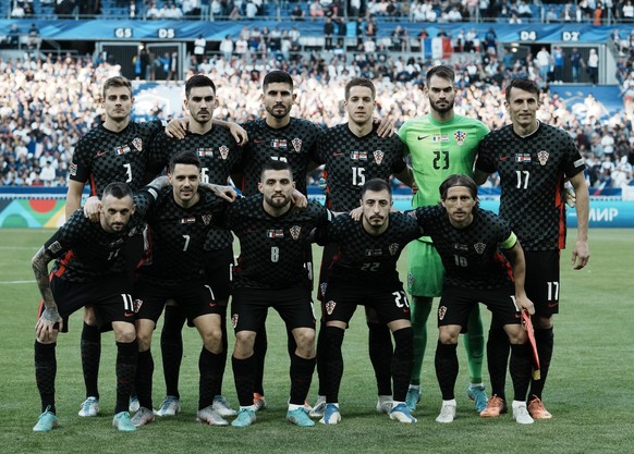 Croatian players pose ahead of the UEFA Nations League soccer match between France and Croatia at the Stade de France in Saint Denis near Paris, Monday, June 13, 2022. (AP Photo/Thibault Camus)