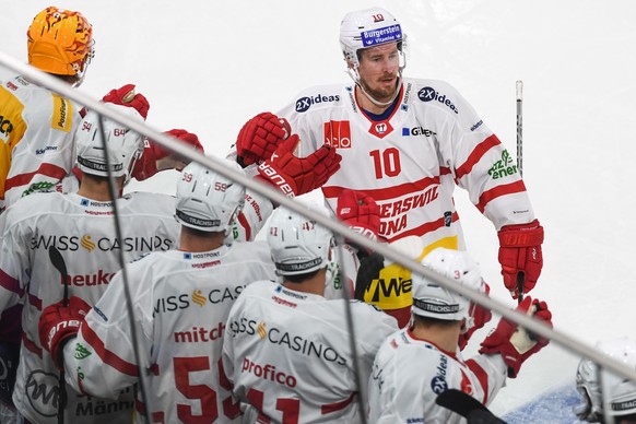 Laker&#039;s Roman Cervenka celebrates with his teammates the 0-1 goal during the preliminary round game of National League Swiss Championship between HC Ambri-Piotta and SC Rapperswil-Jona Lakers at  ...