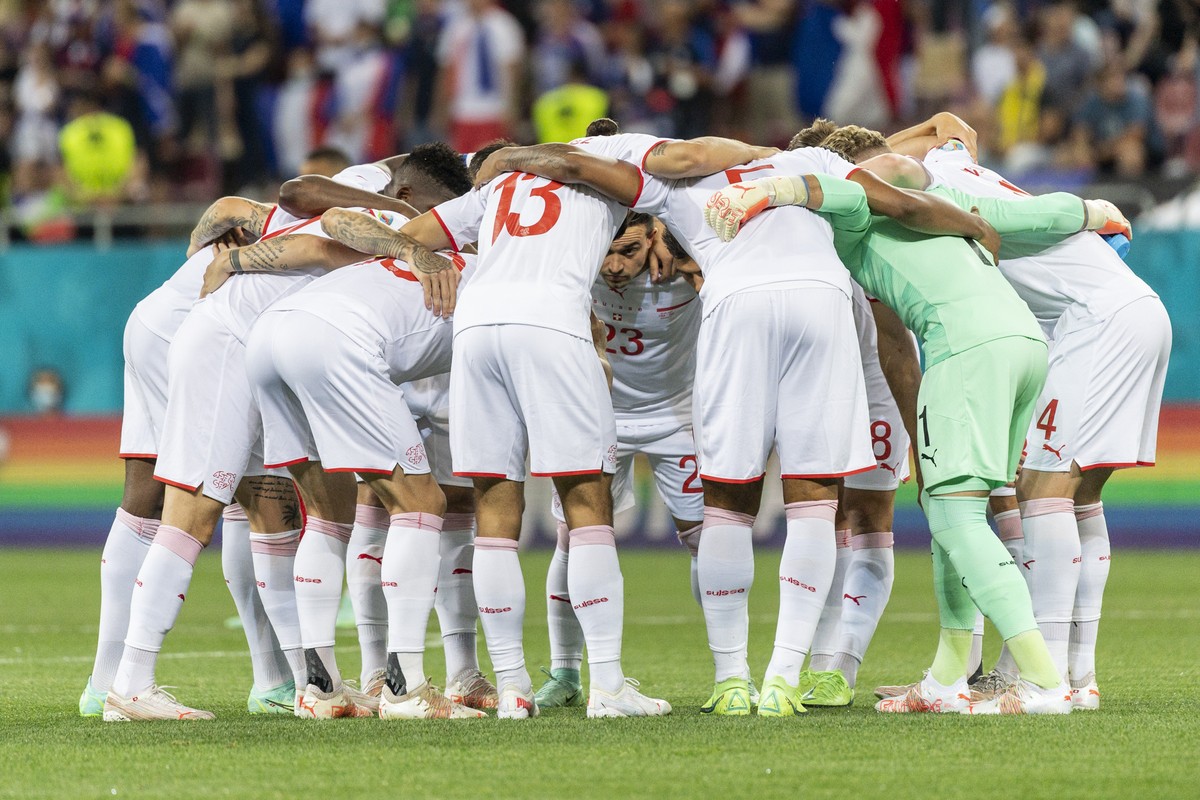 The Swiss players during their prematch routine with Xherdan Shaqiri, center, moments ahead of the Euro 2020 soccer tournament round of 16 match between France and Switzerland at the National Arena st ...