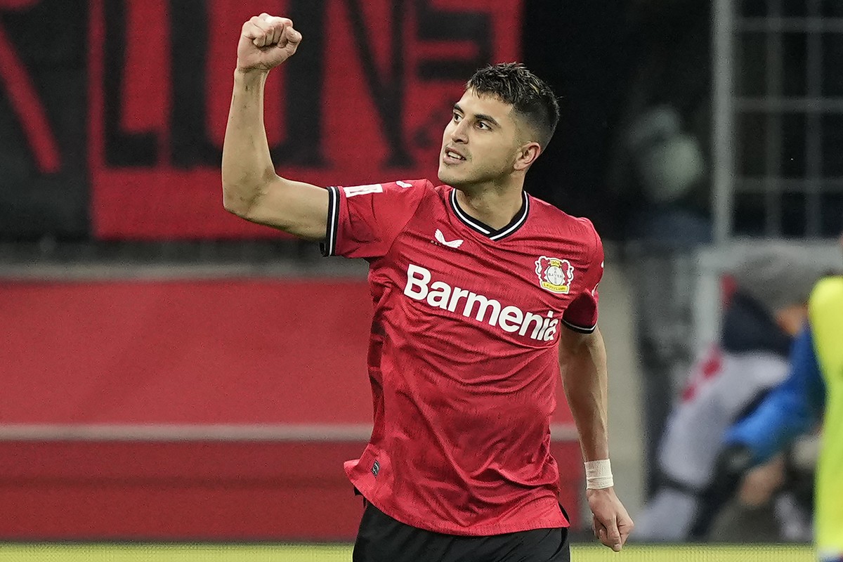 Leverkusen's Exequiel Palacios celebrates scoring his side's first goal during the German Bundesliga soccer match between Bayer Leverkusen and Bayern Munich in Leverkusen, Germany, Sunday, M ...