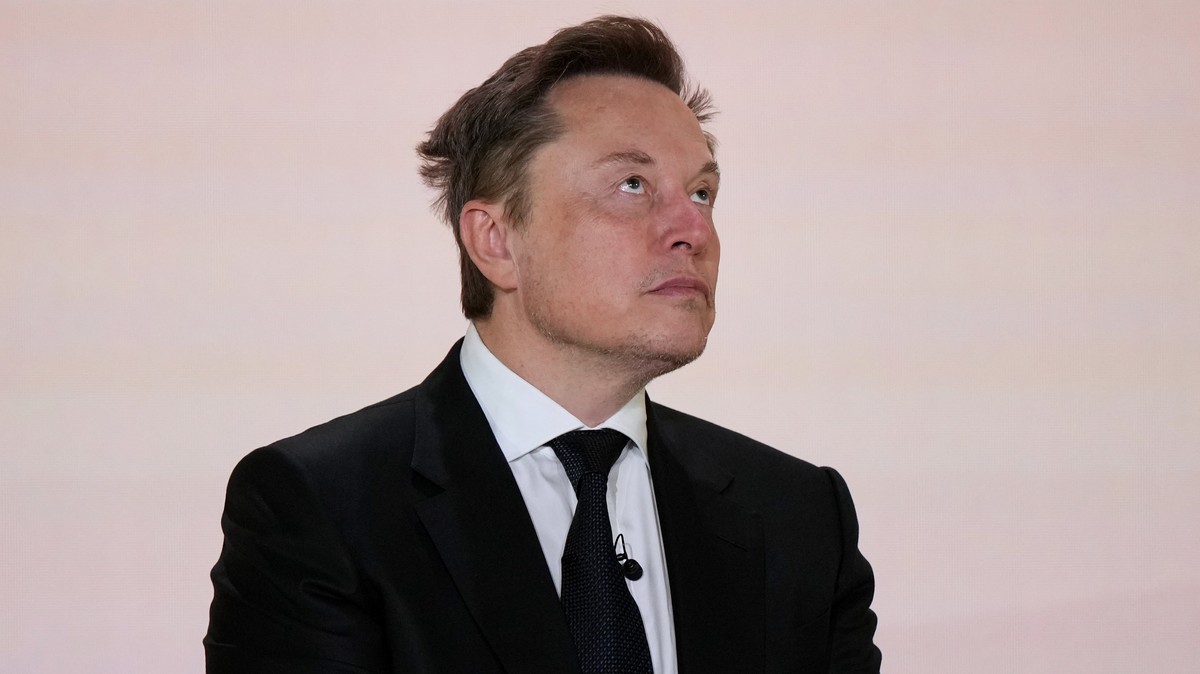 Elon Musk listens during an event to mark the launch of the America.gov website, Tuesday, Sept. 29, 2026, in Washington. (AP Photo/Mark Schiefelbein)
Elon Musk