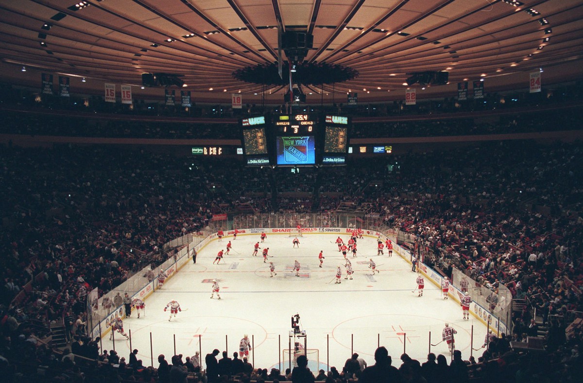 The New York Rangers play the Chicago Blackhawks in NHL action Monday, January 27, 1997, in New York's Madison Square Garden. Hilton Hotels Corp. has offered to buy ITT Corp., owner of the Sherat ...