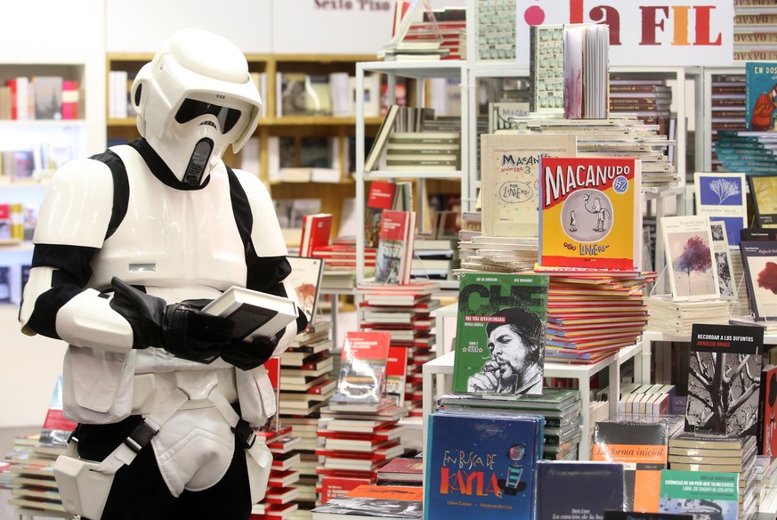 epa05912079 (FILE) People dressed up as Star Wars characters promote book reading at the Guadalajara International Book Fair (FIL), in Guadalajara, Mexico, 02 December 2015. The World Book and Copyrig ...