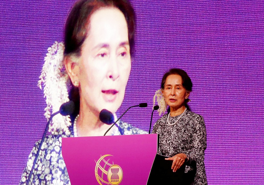 Myanmar&#039;s leader Aung San Suu Kyi delivers the keynote speech at the ASEAN Business and Investment Summit 2018, a parallel summit in the ongoing ASEAN Summit 2018 in Singapore, Monday, Nov. 12, 2 ...