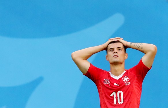 epaselect epa06861448 Granit Xhaka of Switzerland reacts after the FIFA World Cup 2018 round of 16 soccer match between Sweden and Switzerland in St.Petersburg, Russia, 03 July 2018.

(RESTRICTIONS  ...