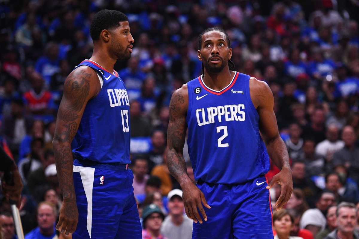 LOS ANGELES, CA - OCTOBER 23: Los Angeles Clippers forward Paul George 13 looks on with Los Angeles Clippers forward Kawhi Leonard 2 during a NBA, Basketball Herren, USA game between the Phoenix Suns  ...