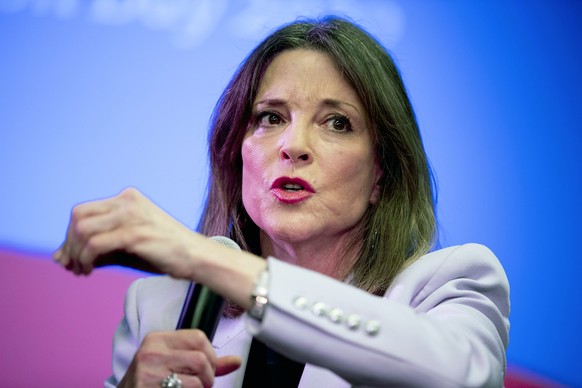 FILE - Democratic presidential candidate Marianne Williamson speaks at the Faith, Politics and the Common Good Forum at Franklin Jr. High School, Jan. 9, 2020, in Des Moines, Iowa. Williamson launched ...