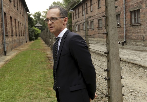 German Foreign Minister Heiko Maas visits the former German Nazi Death Camp Auschwitz Birkenau in Oswiecim, Poland, Monday, Aug. 20, 2018. (AP Photo/Jarek Praszkiewicz)