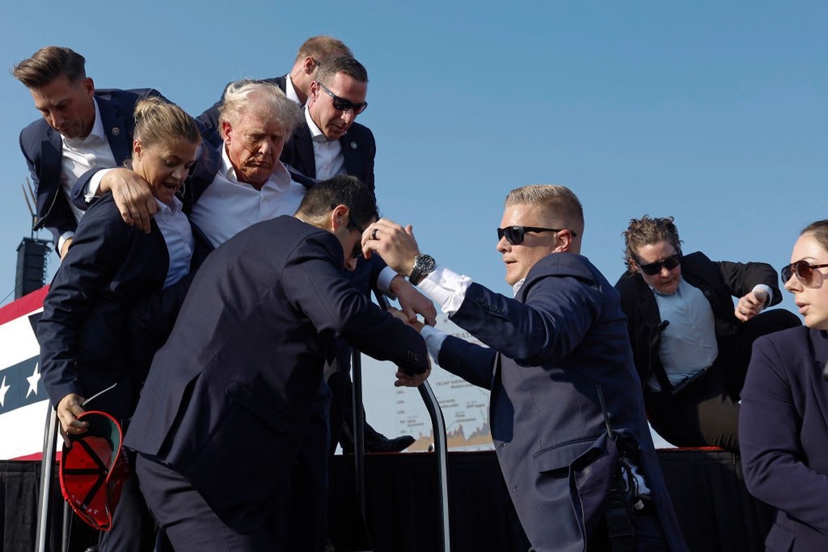 BUTLER, PENNSYLVANIA - JULY 13: Republican presidential candidate former President Donald Trump is rushed offstage by U.S. Secret Service agents after being grazed by a bullet during a rally on July 1 ...