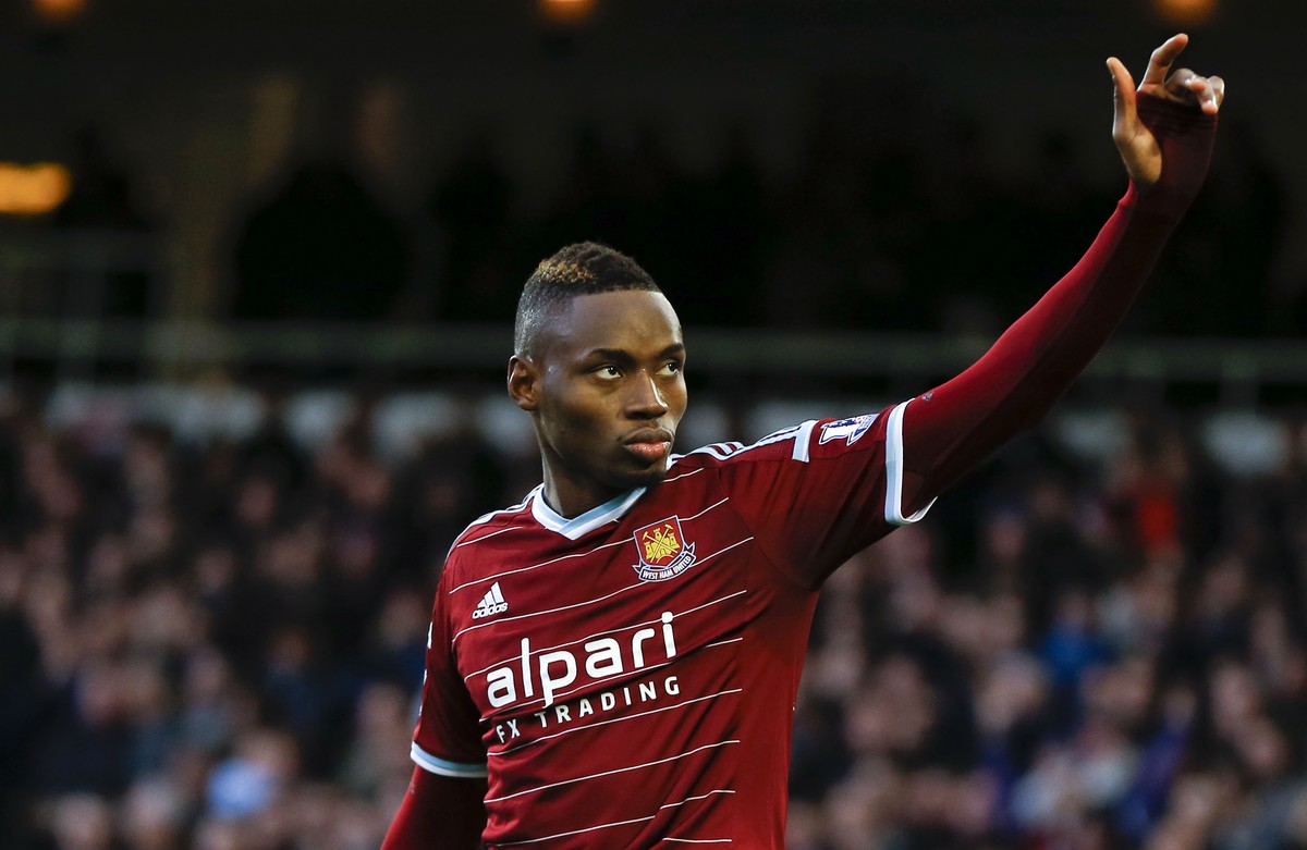 FILE - In this Sunday, Dec. 7, 2014 file photo, West Ham's Diafra Sakho celebrates scoring a goal during the English Premier League soccer match between West Ham and Swansea at White Hart Lane st ...