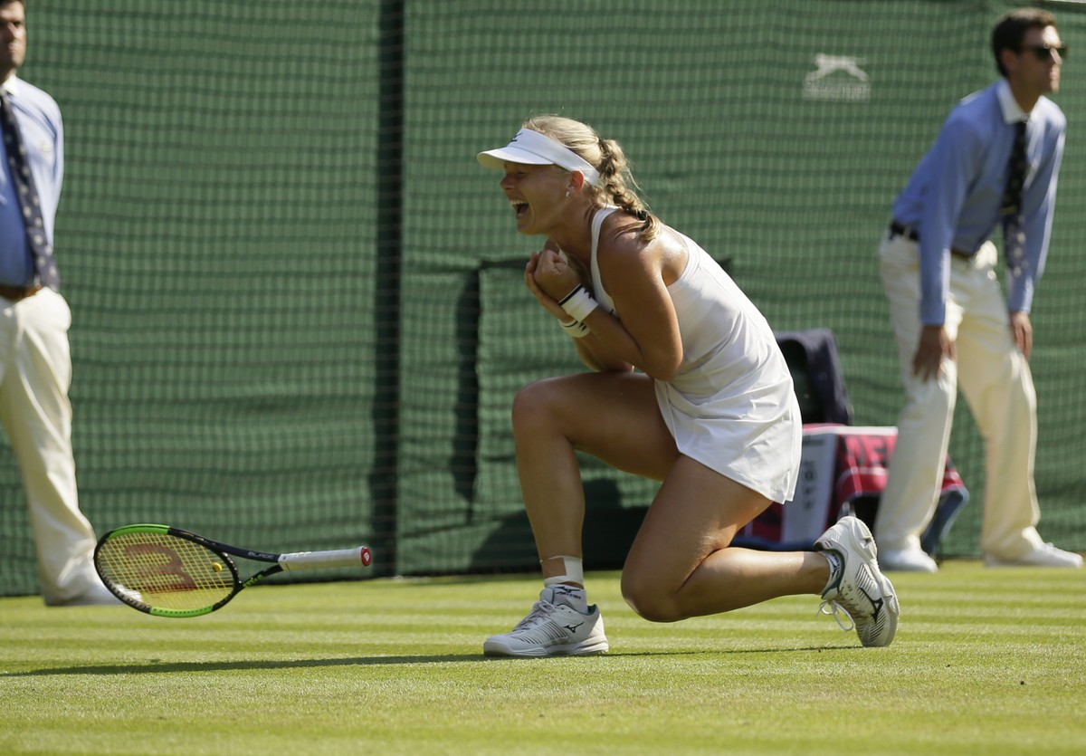 Kiki Bertens of the Netherlands celebrates defeating Venus Williams of the US in their women's singles match on the fifth day at the Wimbledon Tennis Championships in London, Friday July 6, 2018. ...