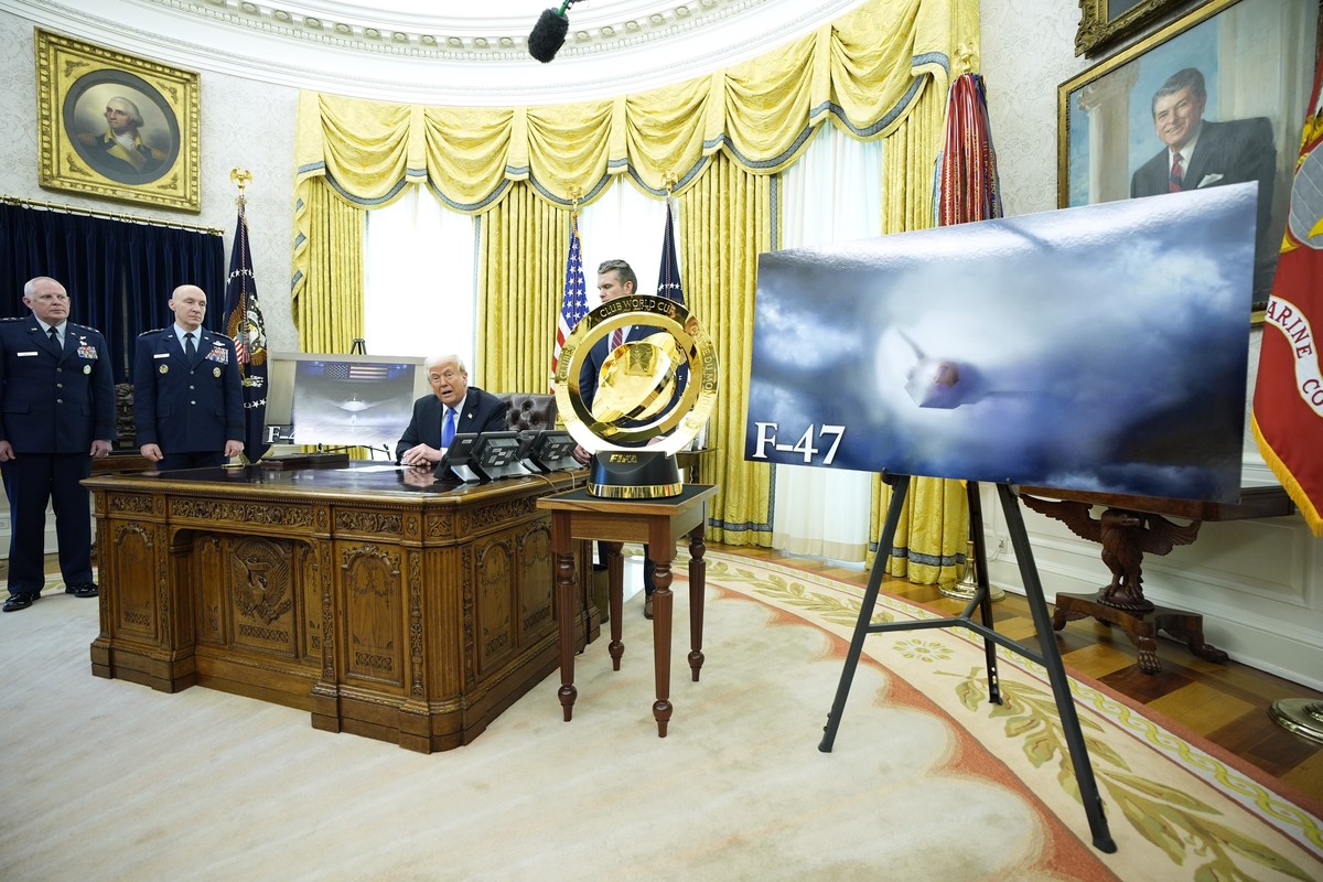 epa11979206 US President Donald Trump (2-R) with Defense Secretary Pete Hegseth (R) and Air Force Chief of Staff Gen. David Allvin (2-L) and US Air Force Lt. Gen. Dale White (L) delivers remarks from  ...