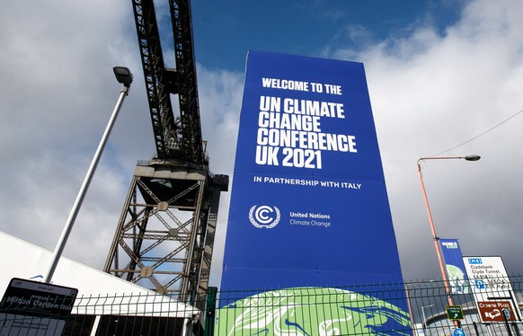 epa09545708 General views of the venue for the COP26 in Glasgow, Britain, 25 October 2021. The 2021 United Nations Climate Change Conference, also known as COP26 and as the Glasgow Conference, is the  ...