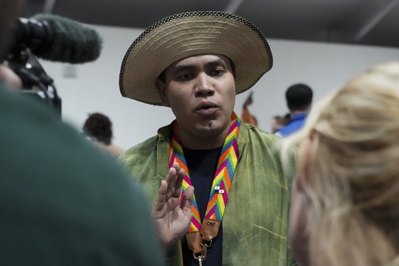 Panama Climate Envoy Juan Carlos Monterrey Gomez speaks to members of the media during the COP29 U.N. Climate Summit, Saturday, Nov. 23, 2024, in Baku, Azerbaijan. (AP Photo/Sergei Grits)