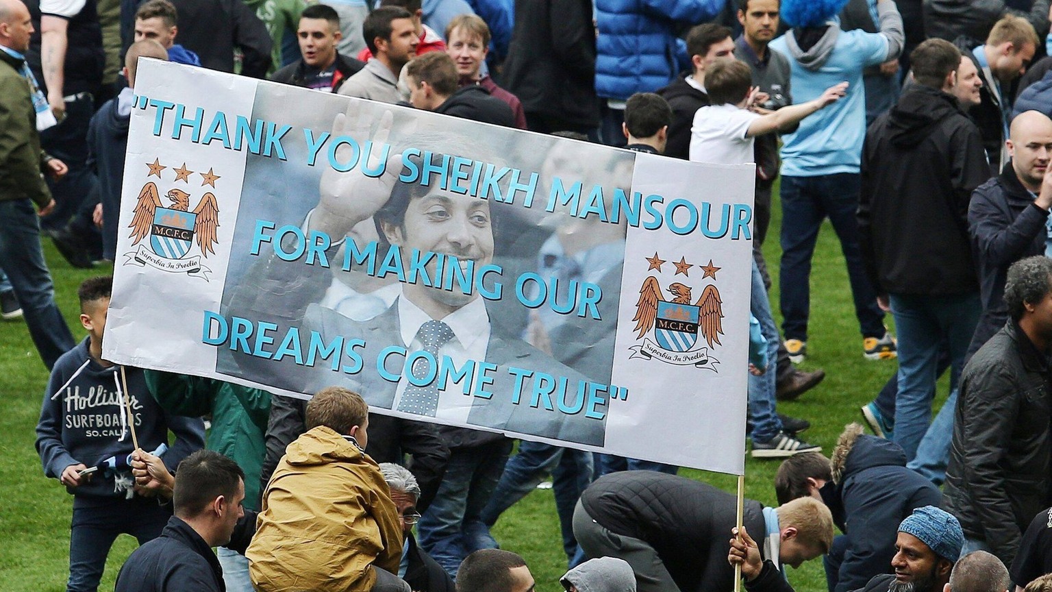 Mandatory Credit: Photo by Matt West/BPI/Shutterstock 3741997bd Manchester City fans display a banner aimed at owner Sheikh Mansour Barclays Premier League 2013/14, Manchester City v West Ham United,  ...