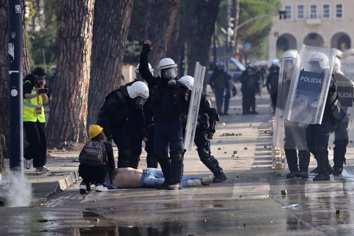 Riot police detain a protester during an anti-government rally, in Tirana, Albania, Saturday, Oct. 24, 2026. (AP Photo/Hameraldi Agolli)
Albania Protests