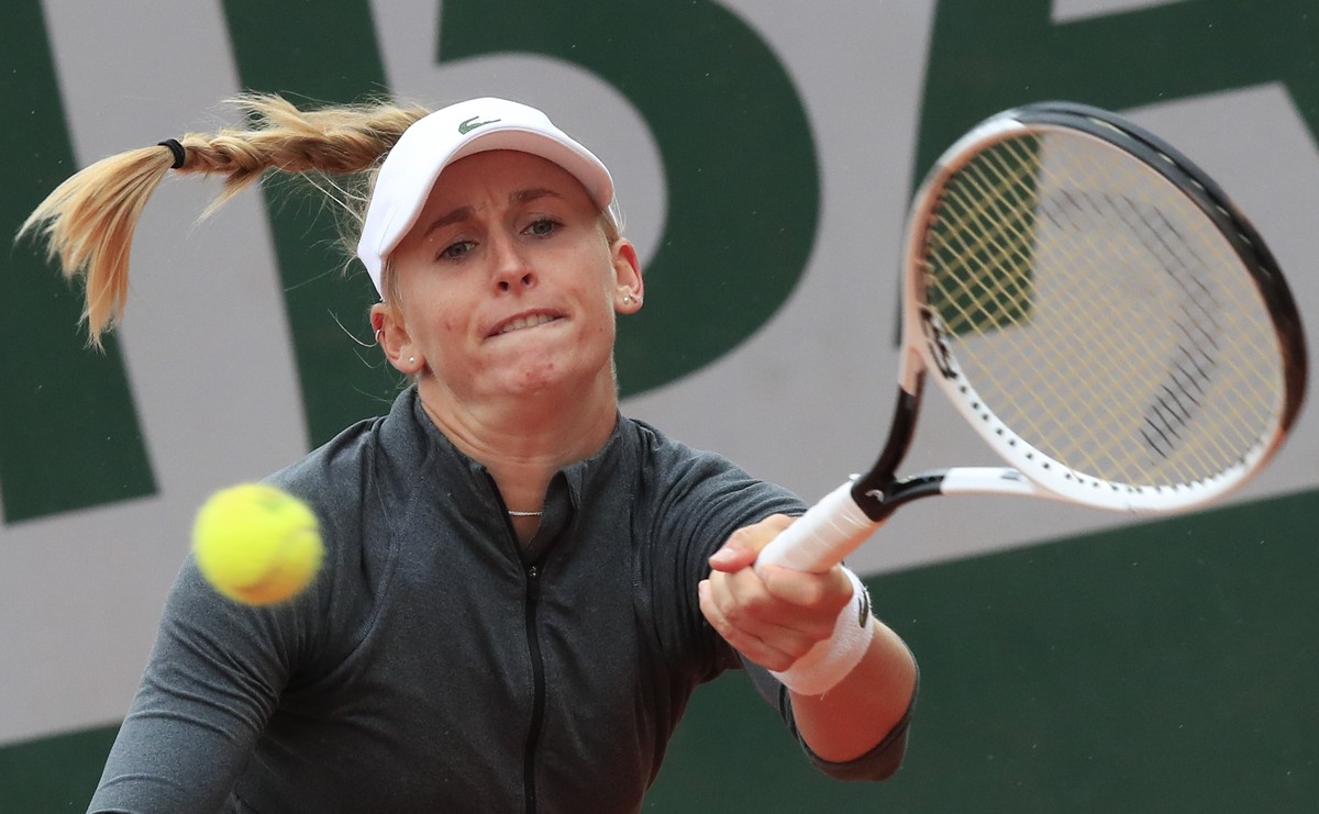 Switzerland's Jil Teichmann plays a shot against Romania's Irina-Camelia Begu in the first round match of the French Open tennis tournament at the Roland Garros stadium in Paris, France, Sun ...
