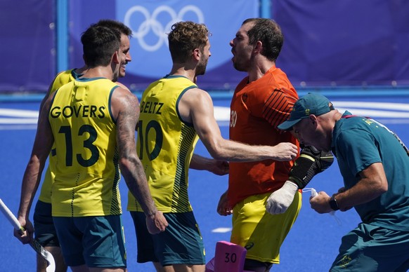Australia goalkeeper Andrew Lewis Charter (30) celebrates with teammates after defeating the Netherlands in a shoot-out during a men&#039;s field hockey match at the 2020 Summer Olympics, Sunday, Aug. ...