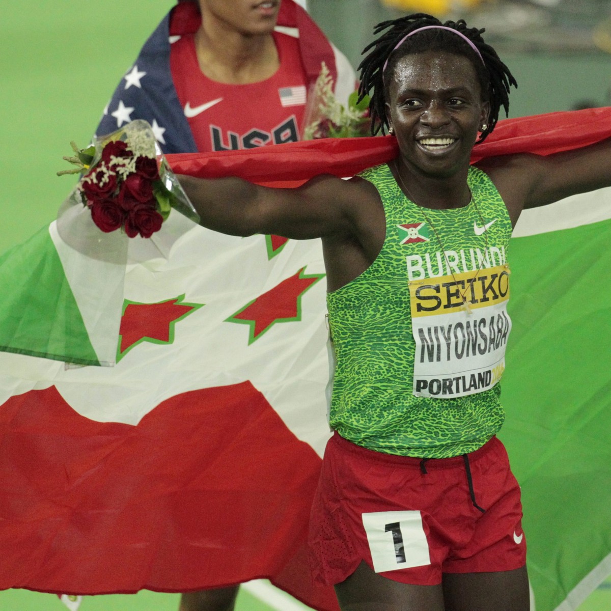 epa05223527 Francine Niyonsaba of Burundi celebrates her first place finish in the women's 800 metres final at the IAAF World Indoor Championships in Portland, Oregon, USA, 20 March 2016. EPA/STE ...