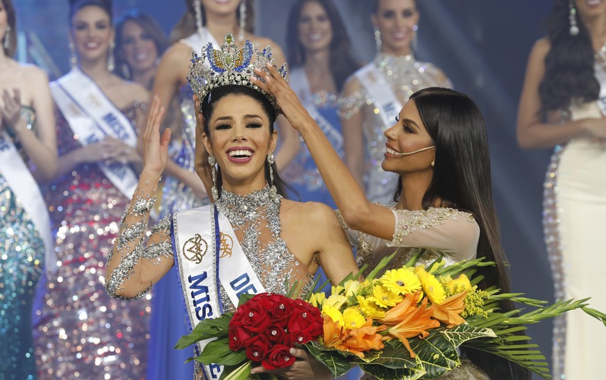 Thalia Olvino, representing Delta Amacuro state, is crowned Miss Venezuela at the end of the beauty pageant in Caracas, Venezuela, Thursday, Aug. 1, 2019. (AP Photo/Ariana Cubillos)