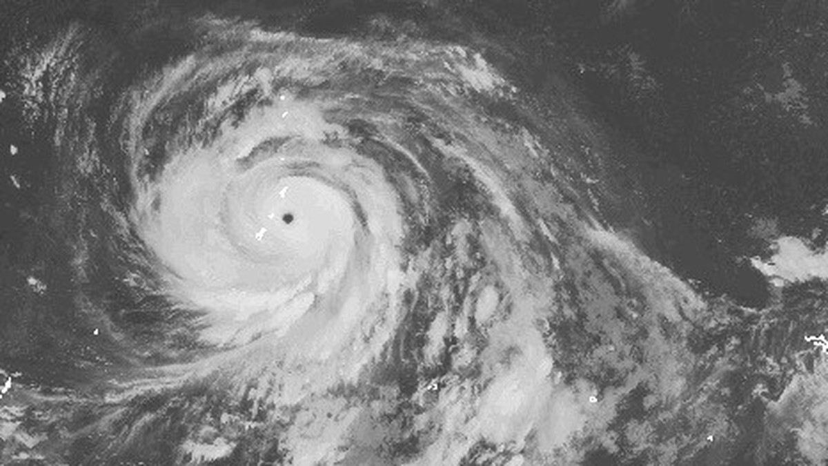 This satellite image released by NOAA shows Typhoon Bavi developing in the western Pacific region near Guam, Sunday, July 5, 2026. (NOAA via AP)
US Tropical Weather