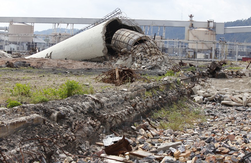 ADVANCE FOR WEDNESDAY, SEPT. 14, 2016, AND THEREAFTER - This Thursday, Sept. 8, 2016, photo shows one of the stacks from the furnace room of the former Ormet plant, at the site in Hannibal, Ohio. For  ...