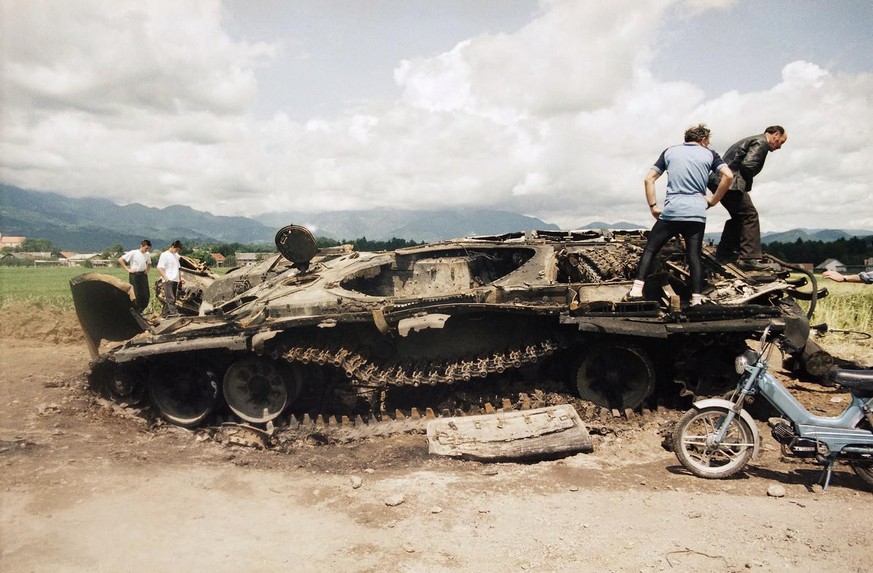 Federal army tanks destroyed in battle with Slovenians in Yugoslavia civil war on July 26, 1991.