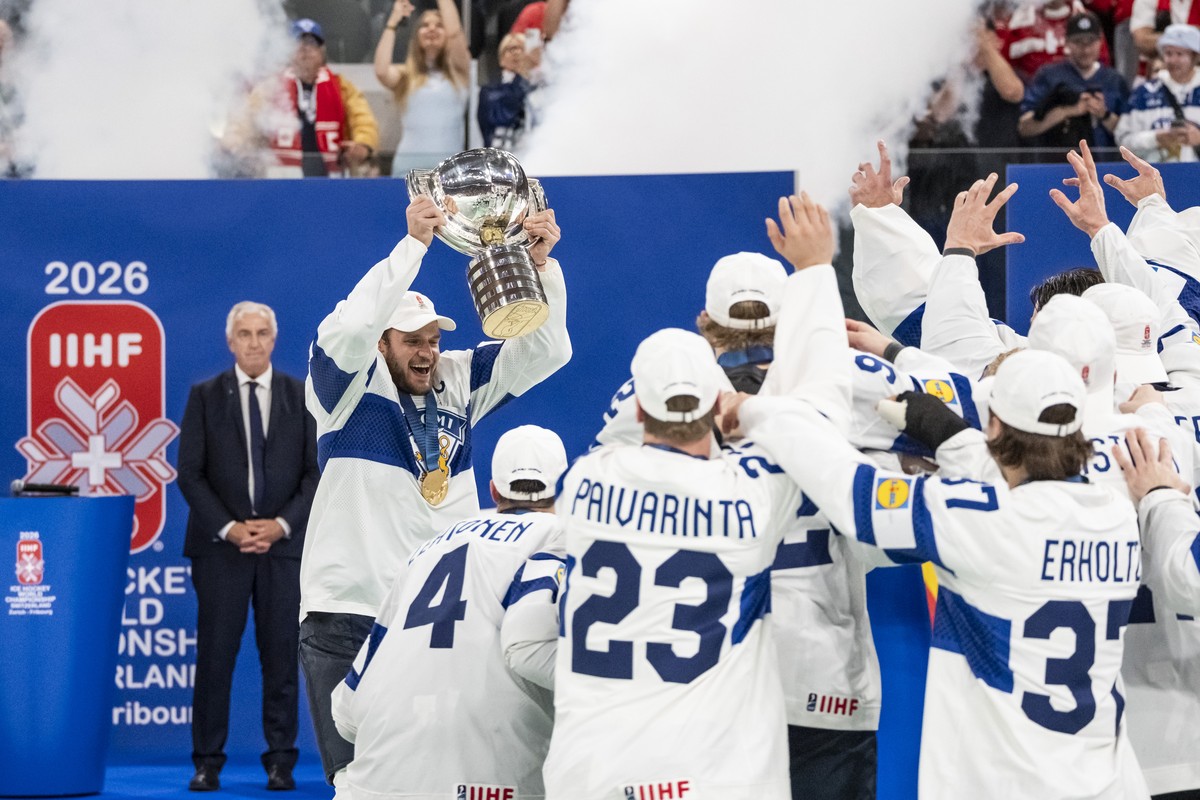 KEYPIX - Finland's captain Aleksander Barkov, left, celebrates with the trophy of World Champion after Finland won against Switzerland in the 2026 IIHF Men's Ice Hockey World Championship go ...